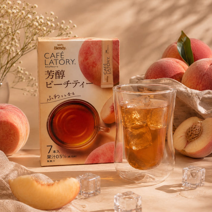 Café Latory peach tea prepared as an iced tea, served in a glass.
